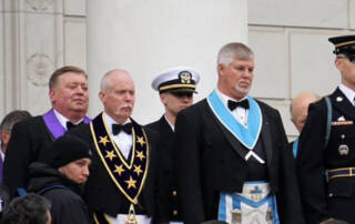 Right Worshipful Grand Master Thomas Gamon IV receiving the wreath