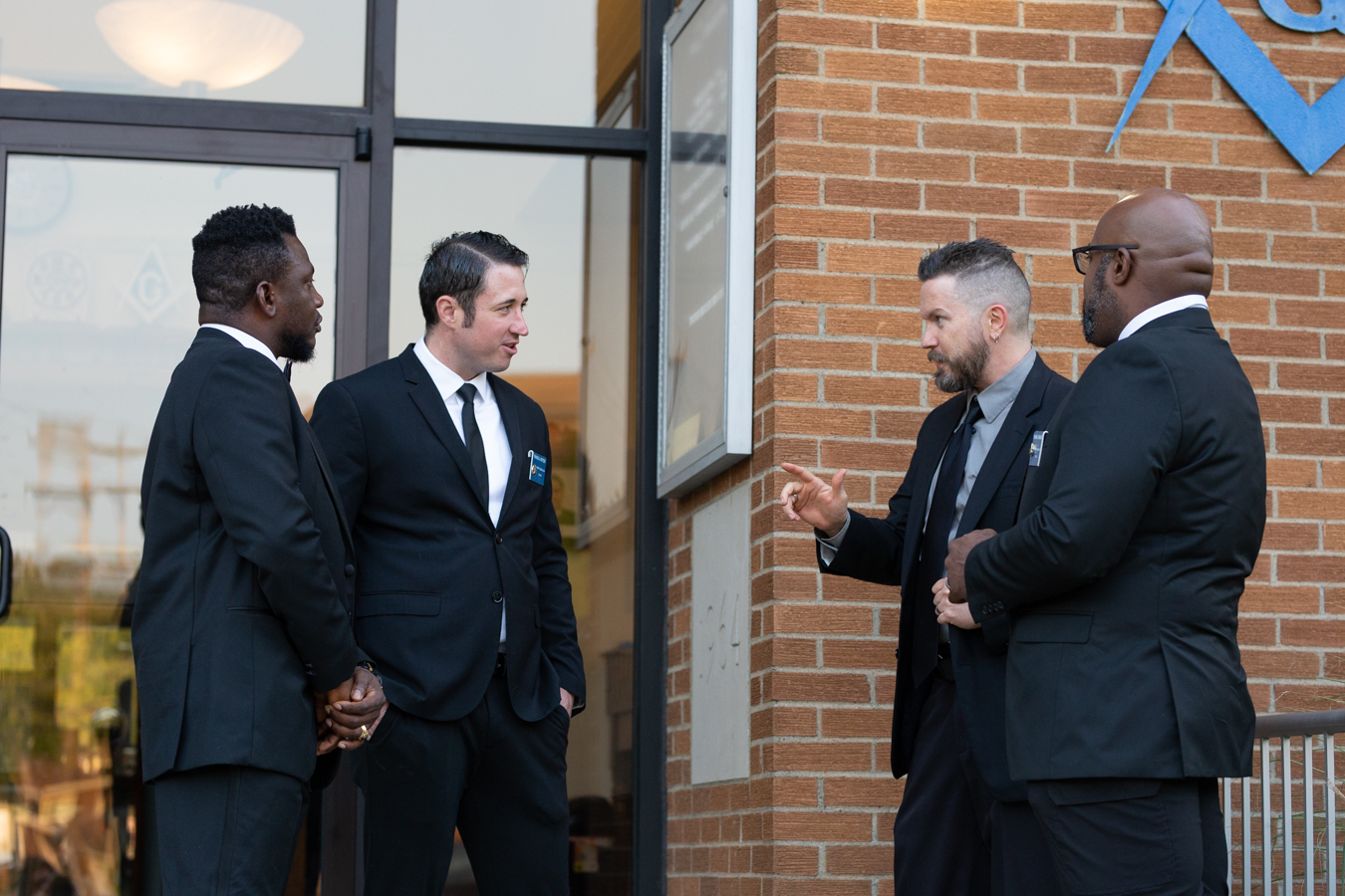 Masons talking together outside of lodge