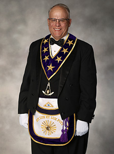 Thomas Gamon with Regalia and Flags