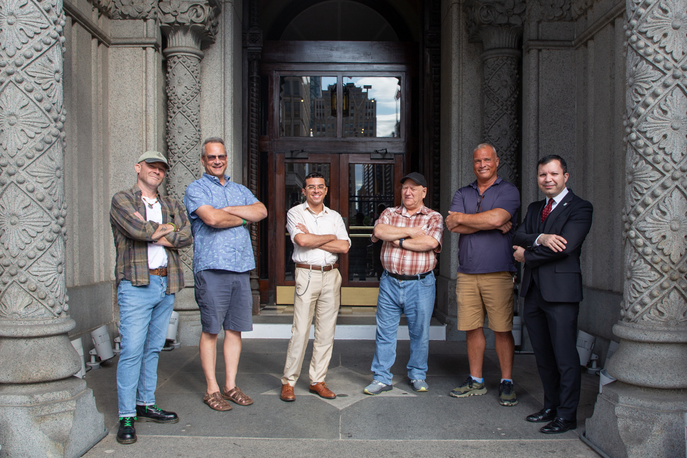 Men standing in front of Masonic Temple.